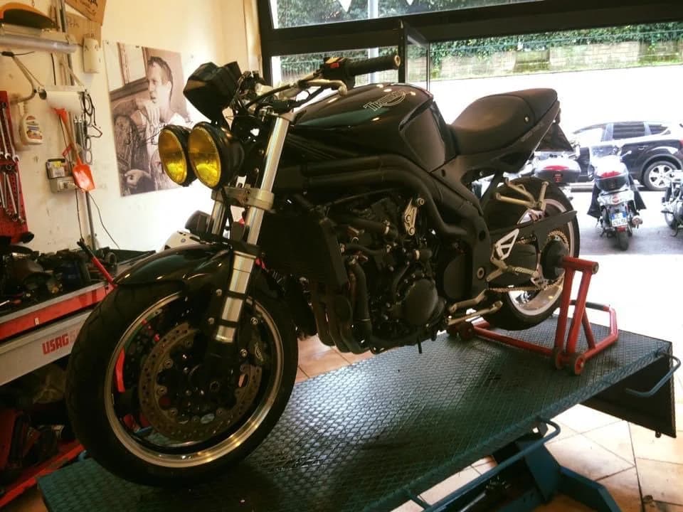 Santi Moto Officina background